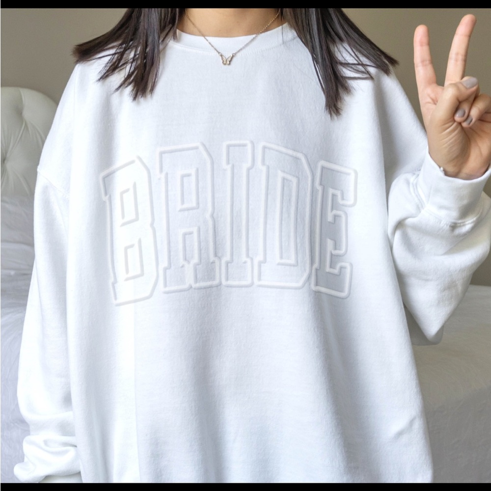 White “BRIDE” pullover sweatshirt